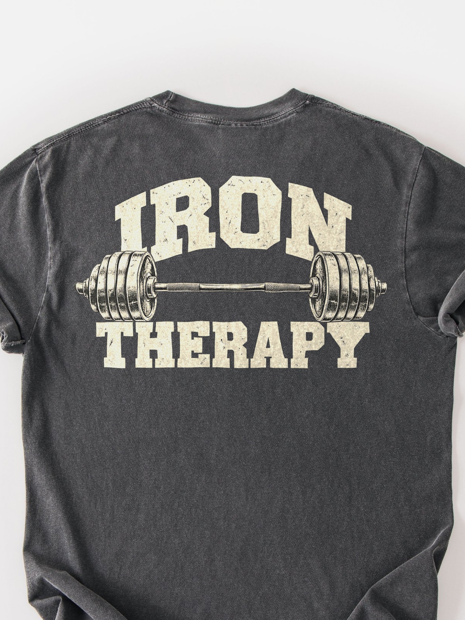 Close-up of the Iron Therapy back print on a Pepper Comfort Colors tee